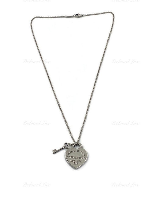 Sold-Tiffany 
Co 925 Silver Return to Tiffany Heart Tag with Key Pendant Necklace