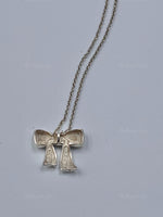 Sold-Tiffany 
Co Sterling Silver 925 Bow Pendant Necklace