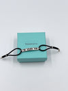 Tiffany 
Co Atlas Roman Numeral Bar Black Rubber Cord Bracelet