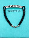 Tiffany 
Co Atlas Roman Numeral Bar Black Rubber Cord Bracelet