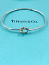 Tiffany 
Co 925 (Silver) 750 (Gold) Love Knot Bangle