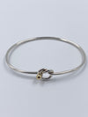 Tiffany 
Co 925 (Silver) 750 (Gold) Love Knot Bangle