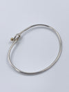 Tiffany 
Co 925 (Silver) 750 (Gold) Love Knot Bangle