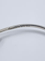 Tiffany 
Co 925 (Silver) 750 (Gold) Love Knot Bangle