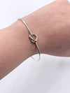 Tiffany 
Co 925 (Silver) 750 (Gold) Love Knot Bangle