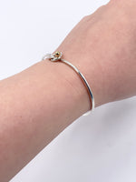 Tiffany 
Co 925 (Silver) 750 (Gold) Love Knot Bangle