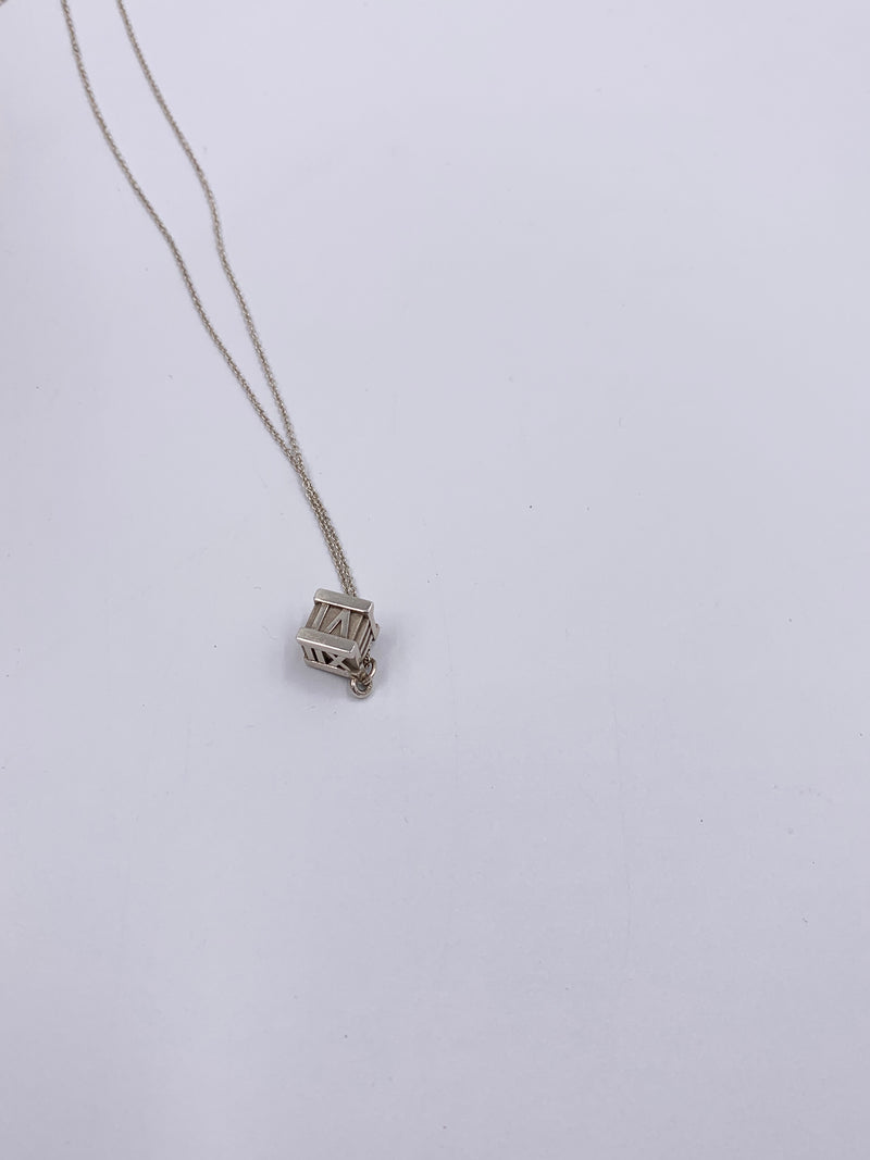 Sold-Tiffany 
Co 925 Silver Atlas Collection Cube with Necklace