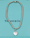 Sold-Tiffany 
Co 925 Silver Return to Tiffany Lock Bead Bracelet