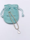 Sold-Tiffany 
Co 925 Silver Return to Tiffany Lock Bead Bracelet