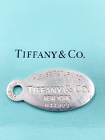 Sold-Tiffany 
Co 925 Silver Return to Tiffany Oval Pendant