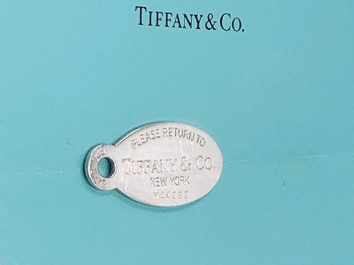 Sold-Tiffany 
Co 925 Silver Return to Tiffany Oval Pendant