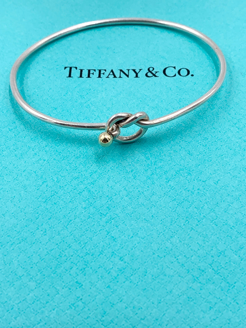 Sold-Tiffany 
Co 925 (Silver) 750 (Gold) Love Knot Bangle