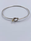 Sold-Tiffany 
Co 925 (Silver) 750 (Gold) Love Knot Bangle