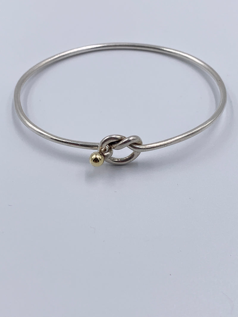 Sold-Tiffany 
Co 925 (Silver) 750 (Gold) Love Knot Bangle