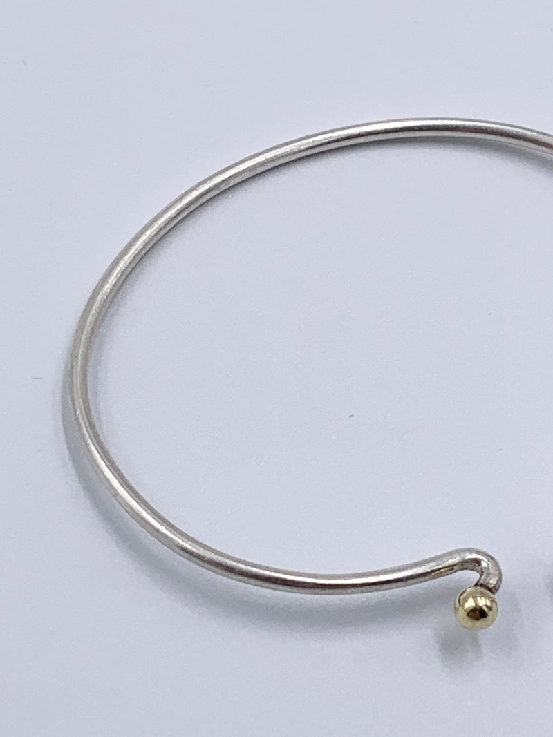 Sold-Tiffany 
Co 925 (Silver) 750 (Gold) Love Knot Bangle