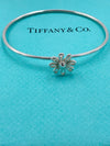 Sold-Tiffany 
Co Paloma Picasso Silver 925 Daisy Flower Bangle