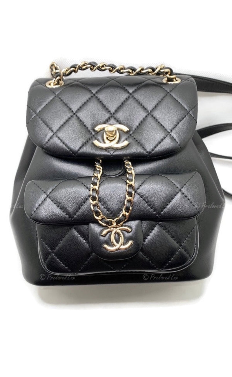 CHANEL Black lambskin Mini Duma Drawstring Backpack / Gold Hardware